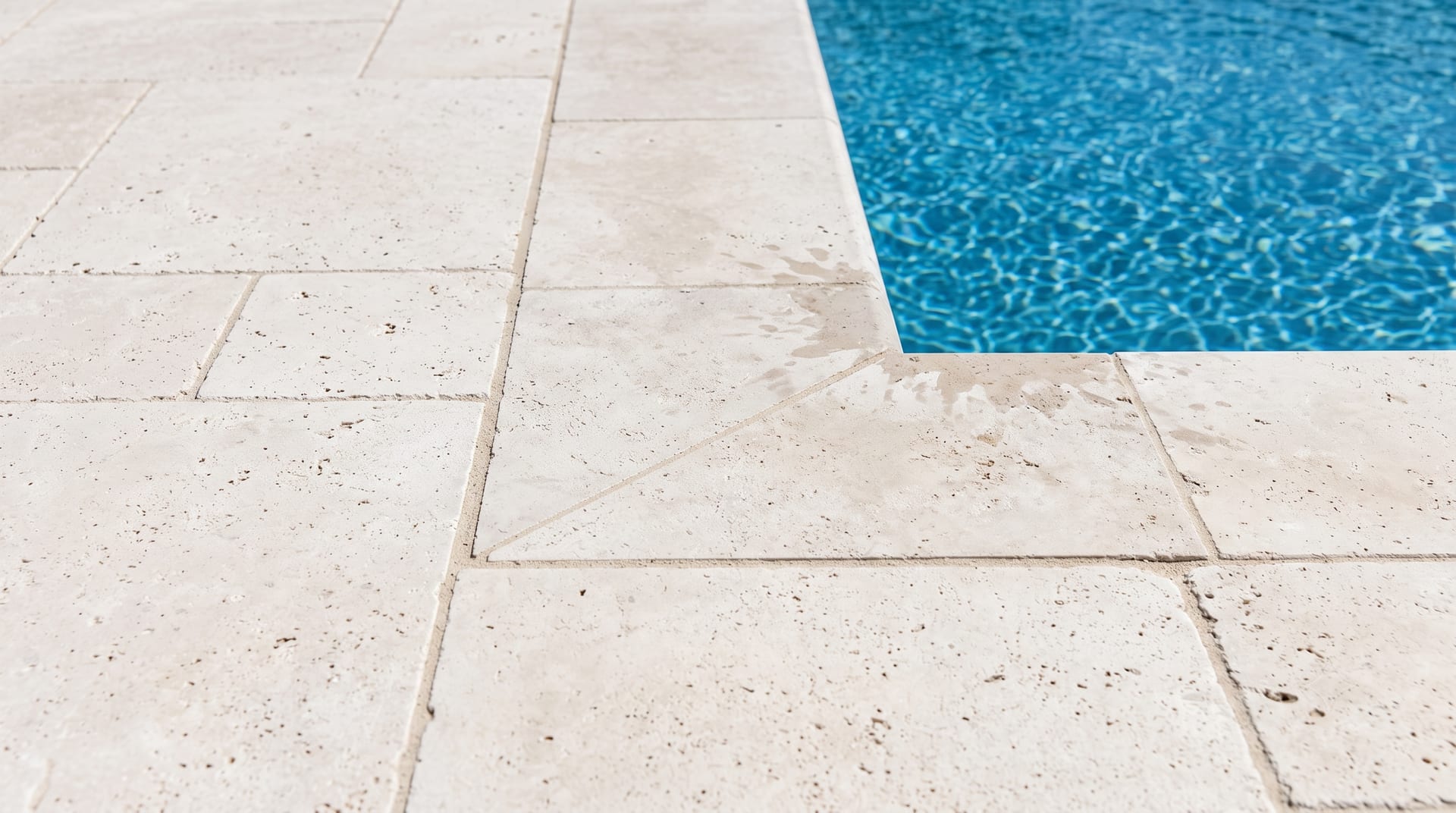 Same travertine clean but unsealed, dry and pale